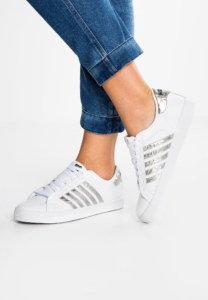 White sneakers with stripes on the side